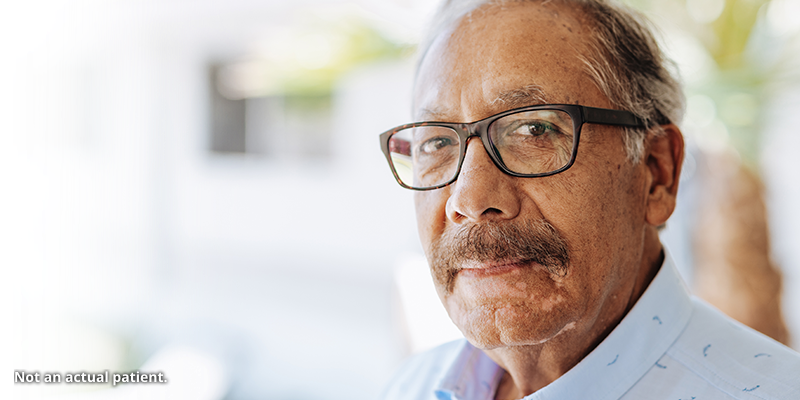 Older man with glasses.